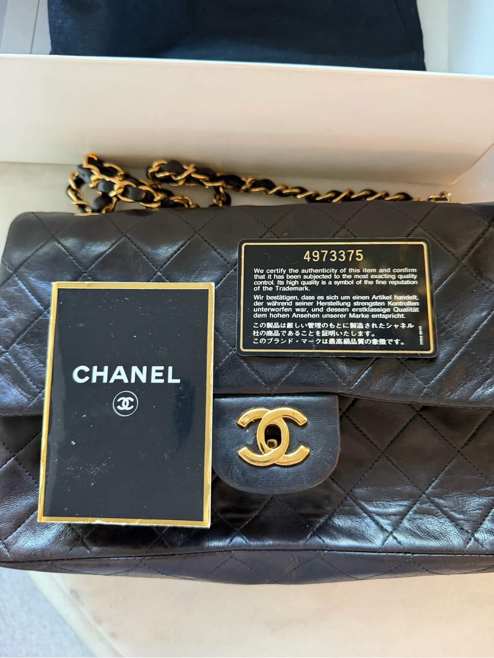 Authentic CHANEL Quilted Lambskin Shoulder Bag in Black with Gold Hardware - Picture 3 of 7